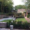 Familie lounge tuin met zwembad