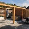 Achtertuin Rosmalen met flagstones en boedha